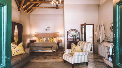 The Old Village Trader Suite | Egyptian cotton sheets, premium bedding, minibar, individually decorated