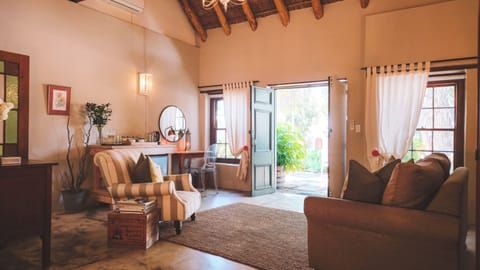 The Old Village Trader Suite | Living area | 32-inch Smart TV with digital channels, TV, Netflix