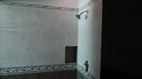 Junior Suite, 1 King Bed | Bathroom | Shower, free toiletries, towels