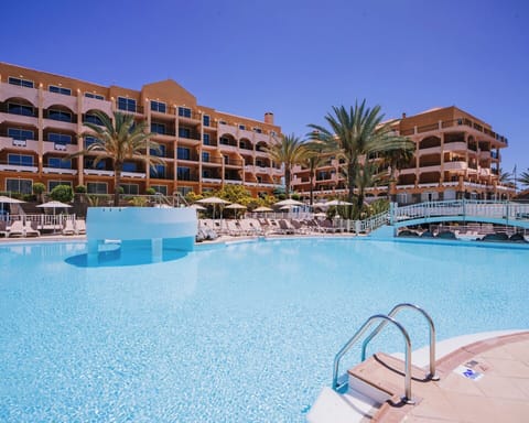 2 outdoor pools, pool umbrellas, sun loungers