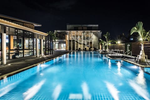 Outdoor pool, open 7:00 AM to 10:00 PM, sun loungers