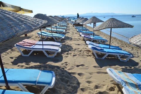 Private beach nearby, sun loungers, beach umbrellas