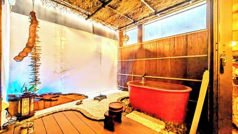 Suite (2 Semi-double Beds and 2 Japanese Futons) | Bathroom | Combined shower/tub, jetted tub, rainfall showerhead