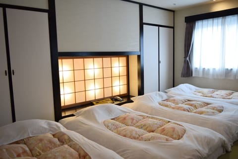 Japanese-style Room, Non Smoking | Down comforters, desk, free WiFi, bed sheets