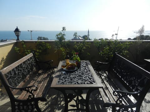 Suite, 1 Bedroom, Kitchenette, Sea View | Terrace/patio