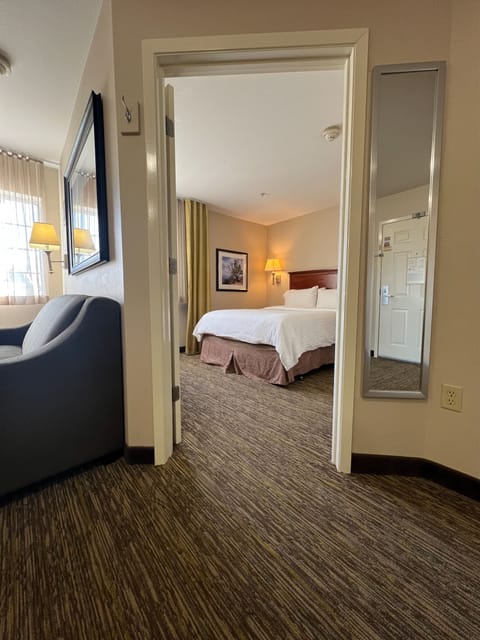 Suite, 1 Bedroom (1 Queen Bed) | In-room safe, desk, iron/ironing board, cribs (free)