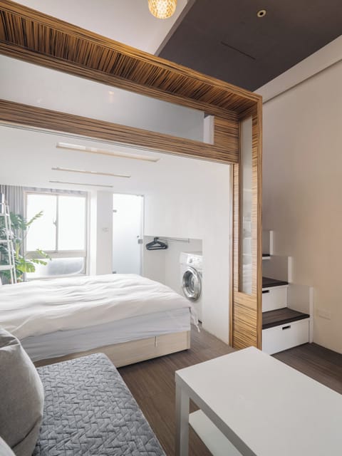 Signature Twin Room, 2 Double Beds | Living area | 32-inch LED TV with cable channels, TV