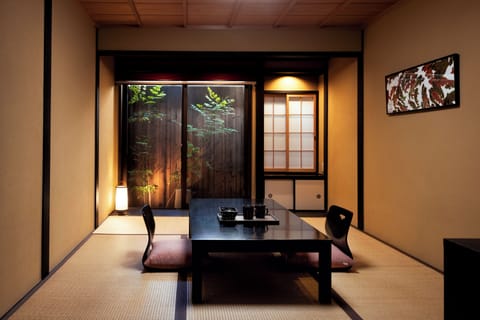 Japanese Style Town House | Living area | Flat-screen TV