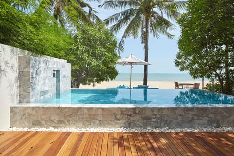 1-Bedroom Beachfront Pool Villa | Minibar, in-room safe, desk, laptop workspace