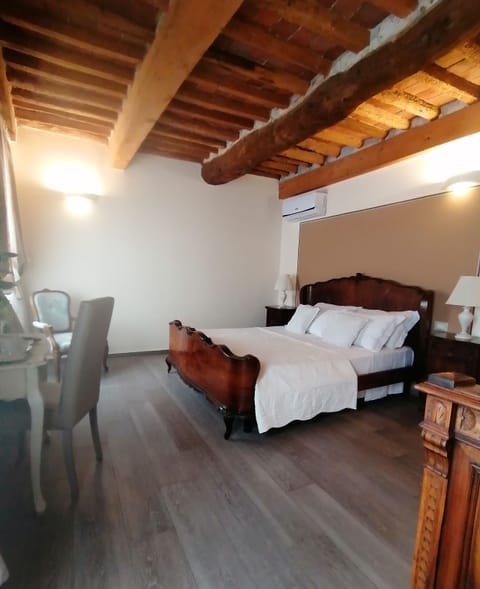 Luxury Room, Multiple Beds | Minibar, individually furnished, iron/ironing board