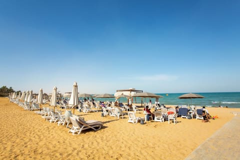 Private beach nearby, free beach shuttle, sun loungers, beach umbrellas