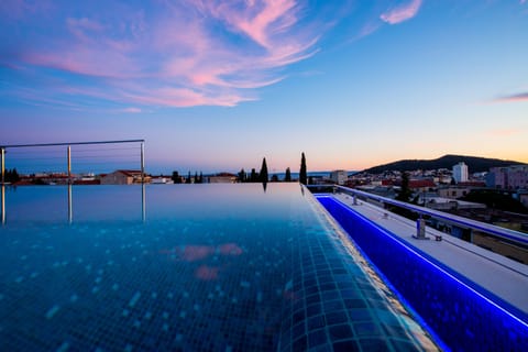 Seasonal outdoor pool, pool umbrellas, sun loungers