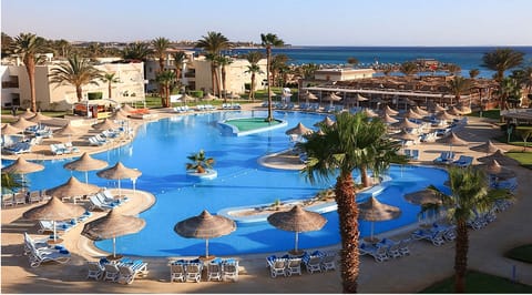 Outdoor pool, pool umbrellas, sun loungers