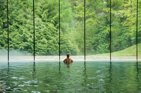 Indoor pool, outdoor pool, pool umbrellas, sun loungers