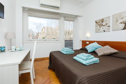Basic Double Room, City View | 1 bedroom, down comforters, in-room safe, desk