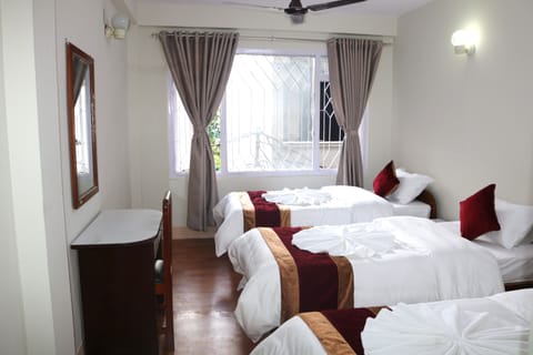 Economy Triple Room, 3 Bedrooms, Private Bathroom | In-room safe, desk, laptop workspace, WiFi (free)