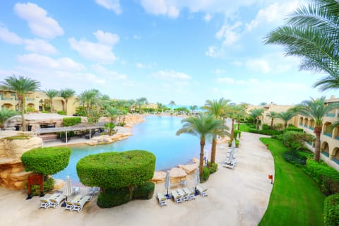 Indoor pool, outdoor pool, pool umbrellas, sun loungers