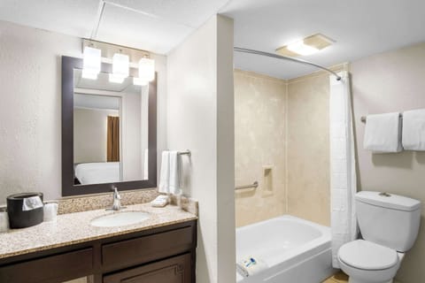 Desk, blackout drapes, iron/ironing board, free cribs/infant beds