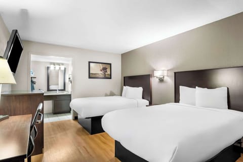 Standard Room, 2 Double Beds, Non Smoking | Desk, blackout drapes, iron/ironing board, free cribs/infant beds