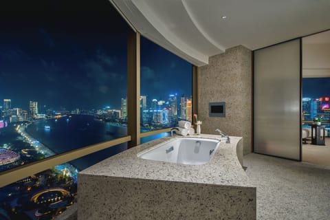 Separate tub and shower, rainfall showerhead, hair dryer, bathrobes