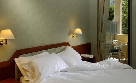 Down comforters, minibar, in-room safe, desk