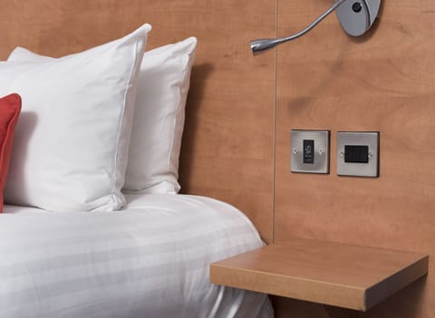 Premium bedding, desk, iron/ironing board, free cribs/infant beds