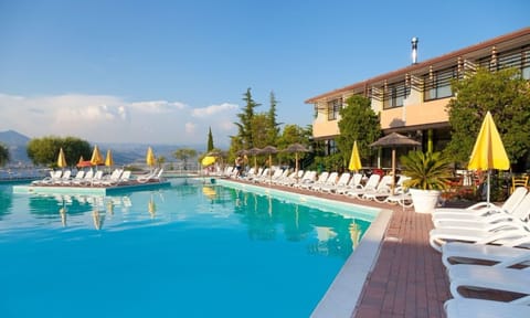 Outdoor pool, pool umbrellas, sun loungers