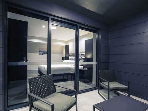 Apartment, 1 Queen Bed, Balcony (West End) | Minibar, in-room safe, desk, soundproofing