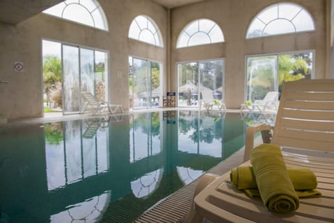 Indoor pool, outdoor pool, open 9:00 AM to 8:00 PM, pool umbrellas