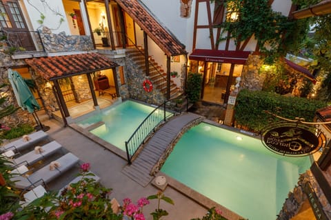 Outdoor pool, open 8:00 AM to 2:30 PM, pool umbrellas, sun loungers
