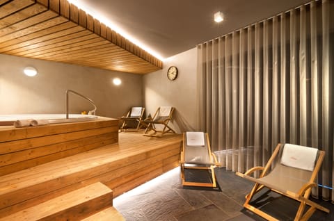 Sauna, hot tub, steam room, hot stone massages, sports massages