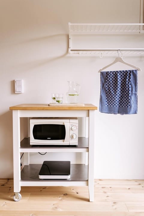 Design Apartment | Private kitchen | Shared fridge, microwave, highchair