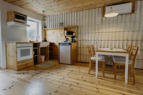 Design Apartment | Private kitchen | Shared fridge, microwave, highchair