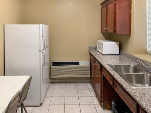 Suite, 1 King Bed with Sofa bed, Non Smoking (Efficiency, Upgrade) | Desk, laptop workspace, blackout drapes, soundproofing