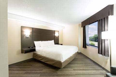 Desk, blackout drapes, iron/ironing board, free cribs/infant beds