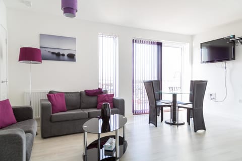 Apartment, 2 Bedrooms (The Penthouse) | Living room | Flat-screen TV