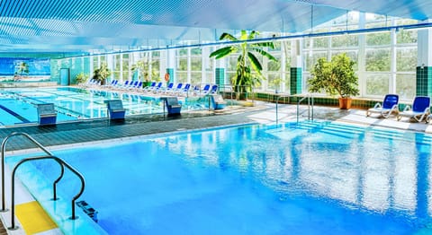 Indoor pool, seasonal outdoor pool, pool umbrellas, sun loungers