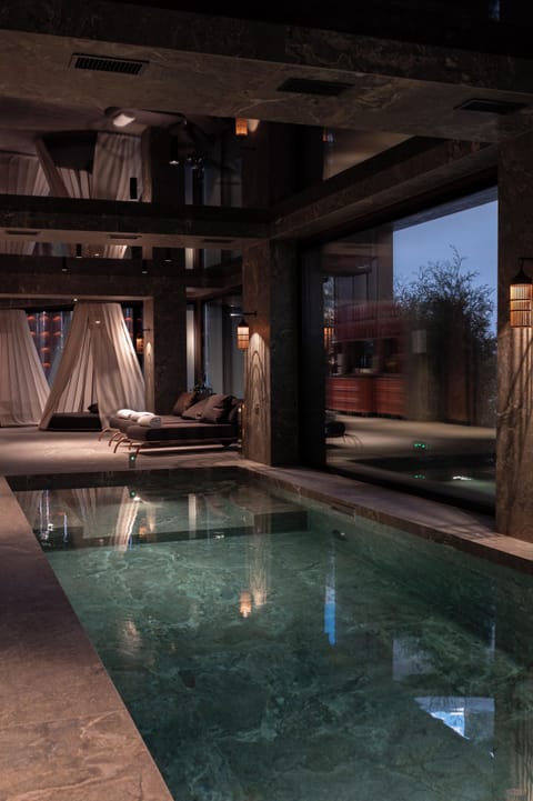 Indoor pool, open 7:00 AM to 10:00 PM, sun loungers