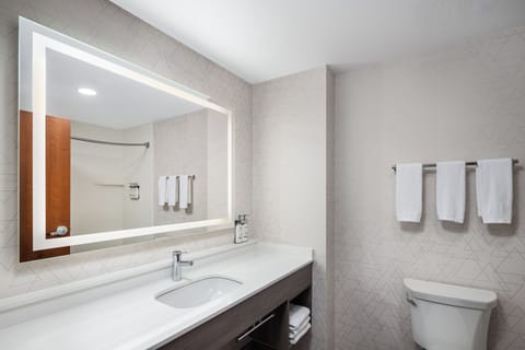 Desk, laptop workspace, blackout drapes, iron/ironing board