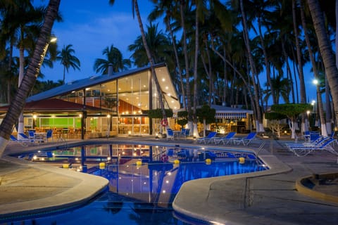Outdoor pool, open 9:00 AM to 9:00 PM, pool umbrellas, sun loungers