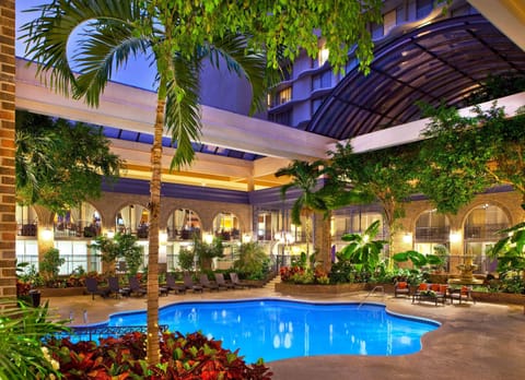 Indoor pool, a heated pool, open 7:00 AM to 10:00 PM, sun loungers