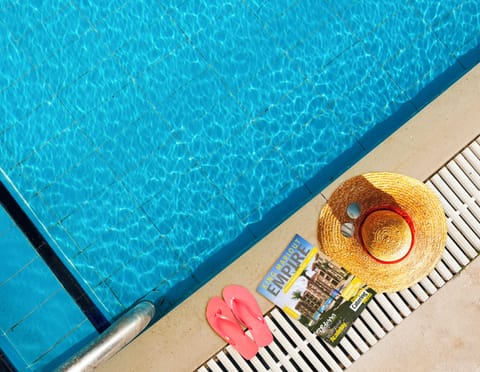 Outdoor pool, pool umbrellas, sun loungers