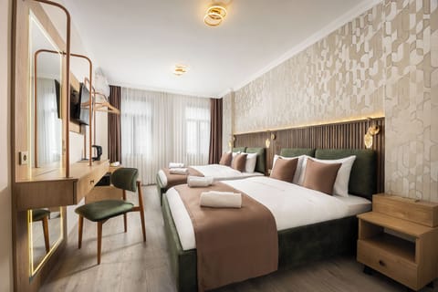 Comfort Quadruple Room | Premium bedding, minibar, in-room safe, soundproofing