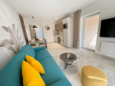 Superior Apartment, 1 Bedroom, Balcony, Sea View | Living area | 60-inch flat-screen TV with satellite channels, TV