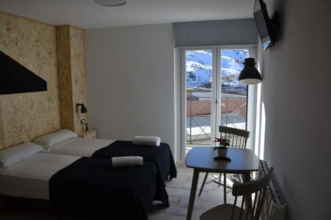 Blackout drapes, cribs (free), WiFi (free), bed sheets