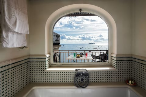 Deluxe Double Room, Balcony, Sea View | Minibar, in-room safe, individually decorated, individually furnished