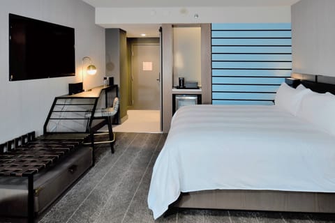 Room, 1 King Bed | Down comforters, desk, blackout drapes, iron/ironing board