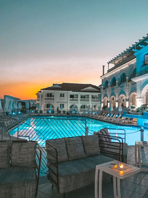 Indoor pool, seasonal outdoor pool, pool umbrellas, sun loungers