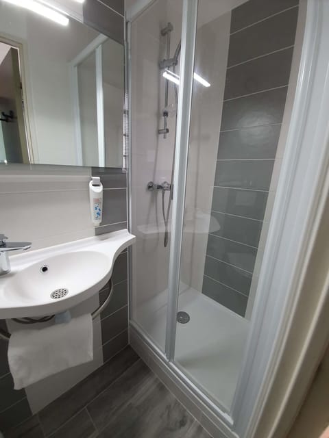 Hypo-allergenic bedding, down comforters, desk, laptop workspace