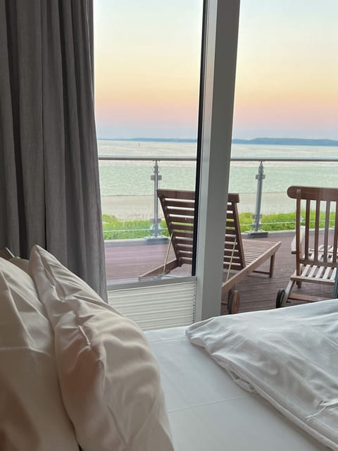 Penthouse, Sauna, Sea View | Minibar, blackout drapes, iron/ironing board, free cribs/infant beds